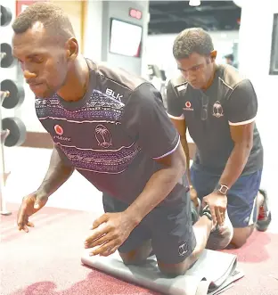  ??  ?? Vodafone Fijian 7s captain Osea Kolinisau with interim coach Nacanieli Cawanibuka during the gym session in Dubai yesterday.