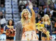  ?? THE ASSOCIATED PRESS FILE PHOTO ?? Former Connecticu­t Sun player Katie Douglas waves as she is honored before a game against the Liberty in 2015 in Uncasville.