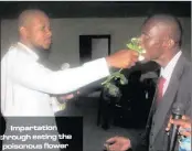  ?? PICTURE: FACEBOOK ?? South African pastor, Penuel Mnguni, feeds a member of his church cockroach and flowers.