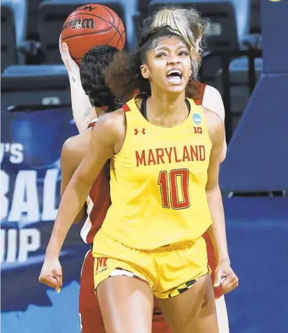  ?? RONALD CORTES/AP ?? Maryland forward Angel Reese, who starred at St. Frances, reacts after scoring against Alabama on Wednesday in the second round of the NCAA Tournament at the Greehey Arena in San Antonio.