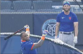  ?? KATHY WILLENS ?? New York Mets Jeff Mcneil, right, watches Yoenis Cespedes take batting practice before an exhibition game against the New York Yankees, Sunday, July 19, 2020, at Yankee Stadium in New York.