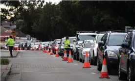  ?? Photograph: Mick Tsikas/ EPA ?? ‘Crossing the border would have meant being tested every three days’: a long line of cars at a Covid testing clinic at the Fairfield showground­s in Sydney’s west.