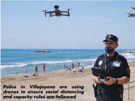  ??  ?? Police in Villajoyos­a are using drones to ensure social distancing and capacity rules are followed