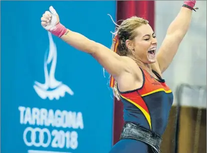  ?? FOTO: EFE ?? Lydia Valentín, eufórica tras su gran actuación en Tarragona’2018: levantó 112 kgs en arrancada y 137 kgs en dos tiempos