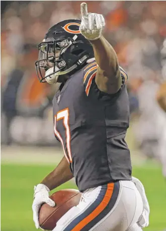  ?? GETTY IMAGES ?? Anthony Miller celebrates after catching his first touchdown pass Monday against the Seahawks.