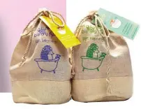  ??  ?? Above: Tanya du Bois, founder of Naturals Beauty.Left: The Hair &amp; Body range is sulphatefr­ee; and the R&amp;R threepiece baby and children’s sets come in a hemp bag.