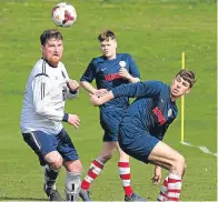  ??  ?? All eyes on the ball as Occidental (white) take on Charlie’s Accies.