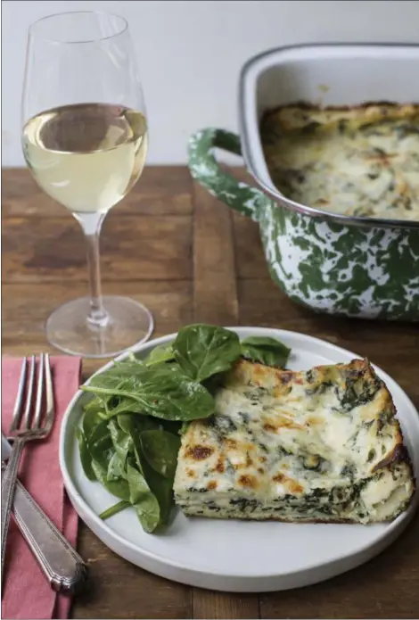  ?? SARAH CROWDER VIA AP ?? This November 2016 photo shows white and green spinach lasagna in New York. This dish is from a recipe by Katie Workman.