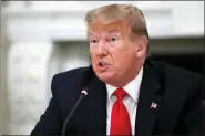  ?? ALEX BRANDON - THE ASSOCIATED PRESS ?? President Donald Trump speaks during a roundtable with governors on the reopening of America’s small businesses, in the State Dining Room of the White House, Thursday, June 18, in Washington.