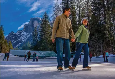  ??  ?? SKATERS ENJOY the ice in Yosemite Valley, right; a snowboarde­r gets some air above Lake Tahoe, bottom.