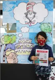  ?? Photo by William Carroll ?? Francis S. Grandinett­i Elementary School student Adeline Mercer, 10 poses with some of the Smencils pencils she sold as part of a fundraiser to help homeless students at the Ridgway Area School District.