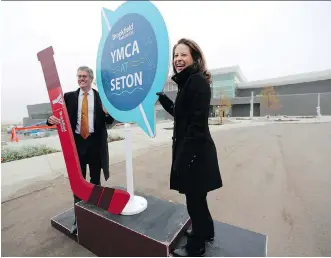  ?? LEAH HENNEL ?? Brookfield Residentia­l CEO Trent Edwards, left and YMCA Calgary president and CEO Shannon Doram announce the new YMCA at Seton in Calgary on Friday, Sept. 14.