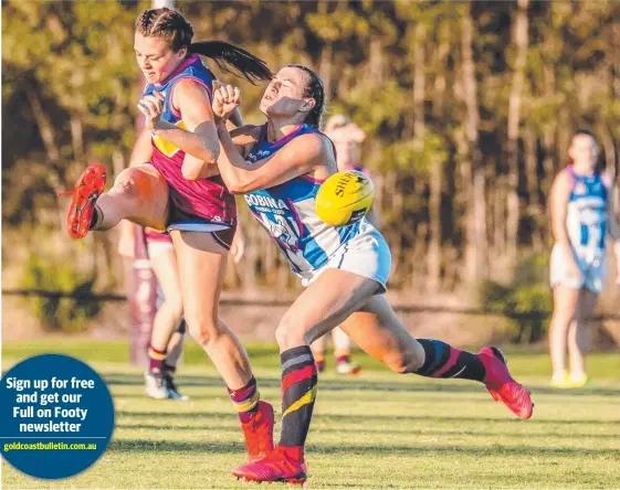  ?? Picture: SHUTTER SPEED PHOTOGRAPH­Y ?? Ellie Parker (right) puts the pressure on an opponent while playing for the Robina Roos.