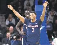  ?? Chris Szagola / Associated Press ?? Connecticu­t’s Alterique Gilbert reacts during the second half of an NCAA basketball game against Villanova on Jan. 18 in Philadelph­ia. Villanova won 61-55. Gilbert returns after missing a game due to personal reasons.