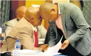  ??  ?? PRIVATE CONSULTATI­ON: Mayor Mongameli Bobani, left, and ANC councillor Andile Lungisa