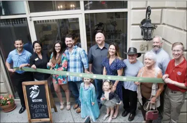  ?? PHOTO PROVIDED BY THE SARATOGA COUNTY CHAMBER OF COMMERCE ?? A ribbon cutting ceremony is held to mark the grand opening onew local business Saratoga Custom Engraving.