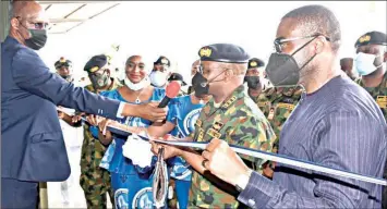  ??  ?? Chief of Staff to the Delta State Governor, David Ediavie ( right); Chief of Naval Staff, Vice Admiral Awwal Gambo; Mrs Loveline Lassa and others at the commission­ing the Nigerian Navy Garment Factory in Sapele, Delta State… yesterday.