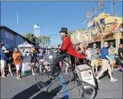  ?? Francine Orr Los Angeles Times ?? THE LOS Angeles County Fair in Pomona will offer several discounts this year. Above, the event in 2016.