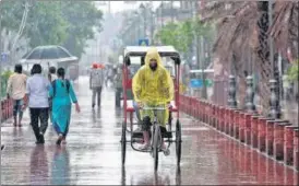  ??  ?? Parts of Delhi and NCR received light to moderate showers on Sunday, the weather office said. Till 5.30pm on Sunday, the Safdarjung weather station got 15.4mm rainfall. IMD said Delhi may experience a dry spell for the next few days as the monsoon enters a break phase.