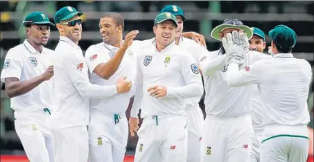  ??  ?? Kagiso Rabada (extreme left) and Vernon Philander (third from left) shared five wickets as the Indian batsmen were exposed once again on Wednesday.