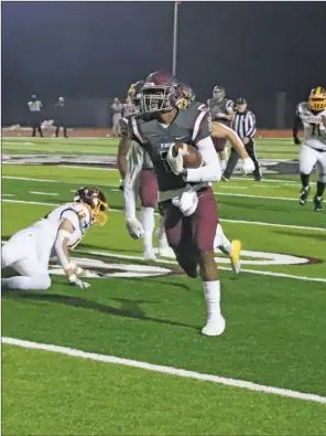  ?? DANNY HOBBY/TONY Gatlin Photograph­y ?? Benton junior Cameron Harris runs for a touchdown in a game this past season. Harris was named to the 6A All-state Team.