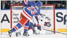  ?? Getty Images ?? FORWARD MARCH: Adam Fox scores a power-play goal in the second period of the Rangers’ 4-1 win over the Blue Jackets on Wednesday, as the Rangers became the first team to 40 wins.