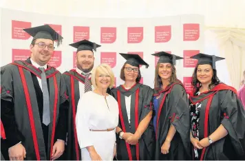  ??  ?? Business studies graduates with tutor