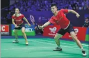  ?? ?? China’s mixed doubles aces Zheng Siwei and Huang Yaqiong claim top spot at the BWF World Tour Finals.