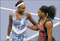  ??  ?? TELL MOM AND DAD I’M STILL BUSY: Venus and Serena Williams after their US Open quarter-final.