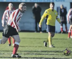  ??  ?? Wearmouth Old Boys (stripes) attack in the Over-40s League last week