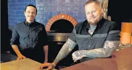  ?? SUSAN STOCKER/SOUTH FLORIDASUN SENTINEL ?? John Cirillo and Chef Jonathan“JD”Eubanks inside the former Sardinia Enoteca Ristorante on Dec. 21 in Delray Beach. They are remodeling to open their new restaurant, Las Catrina’s Modern Mexican, in early 2021.