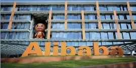  ?? PHOTO: REUTERS ?? While revenue growth has accelerate­d since Alibaba’s 2014 stock exchange listing, aggressive investment in off-line retail, logistics and cloud computing has cut profit margins.