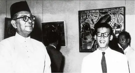  ??  ?? a young chia is all smiles at his art exhibition that was officiated by Prime Minister Tunku abdul rahman in Kuala Lumpur in 1958. — chia yu chian Family collection