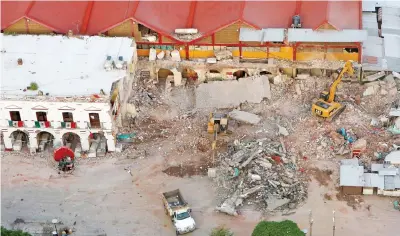  ??  ?? An overview of the municipal building damaged in an earthquake. — Reuters photo