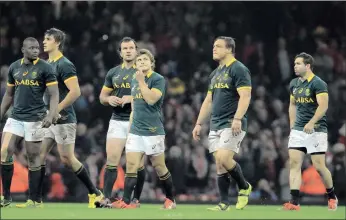  ?? Picture: AP PHOTO/ RUI VIEIRA ?? EXPOSED: South African players leave the pitch after losing 12-6 against Wales at the Millennium Stadium in Cardiff yesterday.