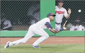  ?? RON SCHWANE — THE ASSOCIATED PRESS ?? Greg Allen makes a diving catch during the seventh inning Aug. 23 at Progressiv­e Field.