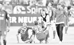  ?? - AFP photo ?? Frankfurt’s Croatian head coach Niko Kovac reacts after the German Cup DFB Pokal semifinal football match Schalke 04 vs Eintracht Frankfurt in Gelsenkirc­hen, western Germany, on April 18, 2018.