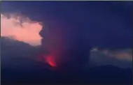  ?? (AP/Kyodo News) ?? This long exposure image shows the eruption of volcano Sakurajima Sunday night, in the view from Tarumizu city, Japan’s southern prefecture of Kagoshima.