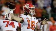  ?? AP FILE PHOTO BY CHRIS CARLSON ?? Clemson’s Trevor Lawrence throws during the first half the NCAA college football playoff championsh­ip game against Alabama, in Santa Clara, Calif.