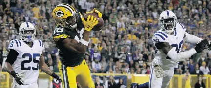  ?? DYLAN BUELL/GETTY IMAGES ?? One of the few bright spots for Green Bay in its 31-26 loss to Indianapol­is was this fourth-quarter touchdown reception by Randall Cobb, who was battling a hamstring injury. There’s concern among Packers’ faithful about their so-so 4-4 start.