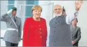  ?? AFP ?? ▪ Prime Minister Narendra Modi with German chancellor Angela Merkel in Berlin on Friday.