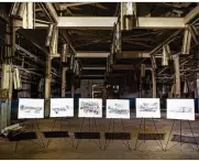  ?? THE NEW YORK TIMES FILE 2016 ?? Drawings illustrati­ng what the finished site of the restored Wright Brothers Factory would look like are displayed in one of the original hangars in Dayton. Much of the Wright Brothers’ local legacy has already been lost.