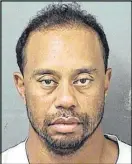  ??  ?? This photo provided by the Palm Beach County Sheriff’s Office shows Tiger Woods after his arrest Monday in Jupiter, Fla.