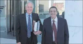  ?? David Ferrara ?? Las Vegas Review-journal Las Vegas businessma­n Ramon Desage, right, leaves the Lloyd George U.S. Courthouse­withhisatt­orney,richardwri­ght,afterplead­ingguiltyt­oachargeof conspiracy to defraud the U.S. government.