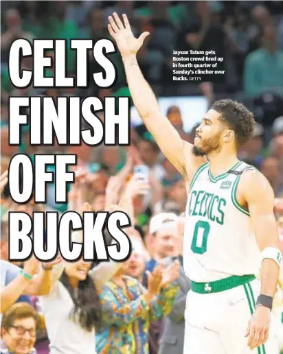 ?? GETTY ?? Jayson Tatum gets Boston crowd fired up in fourth quarter of Sunday’s clincher over Bucks.