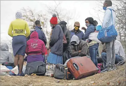  ?? Photo: Phill Magakoe/afp ?? Occupation­al hazards: Women informal cross-border traders in Zimbabwe have much to contend with, between violent hold-ups to the effects of Covid-19 on their business.