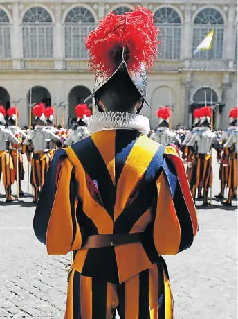  ?? Picture: REUTERS ?? What is the best career advice you ever got and who gave it to you? New recruits of the Vatican’s Swiss Guard stand at attention during the swearing-in ceremony. The Swiss Guard consists of 100 volunteers who must be Swiss, Catholic, single, at least...