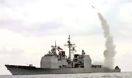  ?? Photo: AP ?? A Tomahawk Land Attack Missile (TLAM) launches from the guided missile cruiser USS Cape St. George (CG 71) in operation in the Mediterran­ean Sea on March 23, 2003.