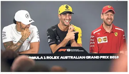  ??  ?? Having fun: Renault’s Daniel Ricciardo (centre) of Australia jokes with Mercedes’ Lewis Hamilton (left) of Britain and Ferrari’s Sebastian Vettel of Germany during the press conference ahead of the Australian Formula One Grand Prix in Melbourne on Thursday. — AP