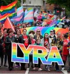  ??  ?? PROTEST: Sara Canning (front centre), partner of murdered journalist Lyra McKee, marching with protesters through Belfast city centre demanding same sex marriage in the North